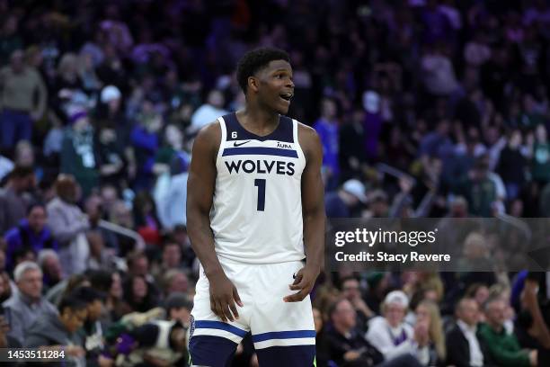 Anthony Edwards of the Minnesota Timberwolves reacts to a score during a game against the Milwaukee Bucks at Fiserv Forum on December 30, 2022 in...