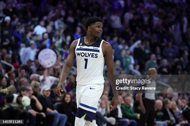 Anthony Edwards of the Minnesota Timberwolves reacts to a score during a game against the Milwaukee Bucks at Fiserv Forum on December 30, 2022 in...