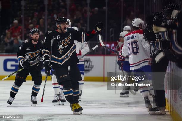 Alex Ovechkin of the Washington Capitals celebrates after Erik Gustafsson scores a goal against the Montreal Canadiens during the first period of the...