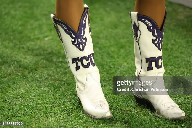 Detail view of the boots of a TCU Horned Frogs cheerleader during the game against the Michigan Wolverines in the Vrbo Fiesta Bowl at State Farm...