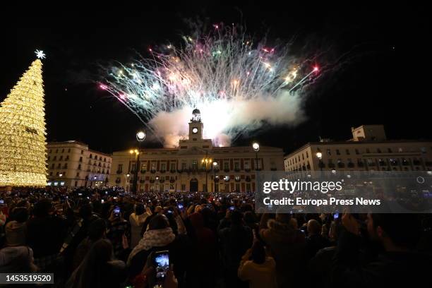 Fireworks at the Real Casa de Correos after the New Year's Eve Chimes 2022, at Puerta del Sol, on January 1 in Madrid, Spain. The capacity in...
