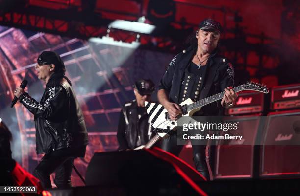 Klaus Meine and Matthias Jabs of the band Scorpions perform at the Brandenburg Gate on December 31, 2023 in Berlin, Germany. For the past two years...