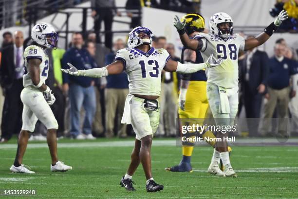 Dee Winters of the TCU Horned Frogs celebrates after a fourth down stop during the fourth quarter against the Michigan Wolverines in the Vrbo Fiesta...