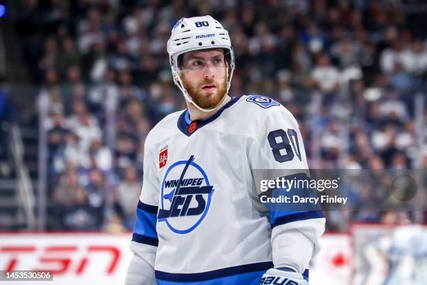 Pierre-Luc Dubois of the Winnipeg Jets looks on during a second period stoppage in play against the Minnesota Wild at the Canada Life Centre on...