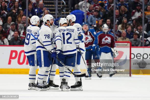 Brodie of the Toronto Maple Leafs celebrates a goal against Alexandar Georgiev of the Colorado Avalanche with teammates during the second period at...