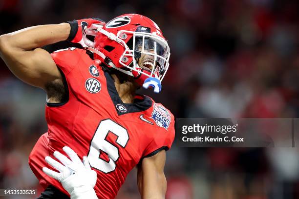 Kenny McIntosh of the Georgia Bulldogs reacts after a touchdown during the first quarter against the Ohio State Buckeyes in the Chick-fil-A Peach...