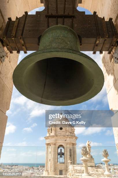 close up of cadiz cathedral bell and tower - belfort stock pictures, royalty-free photos & images