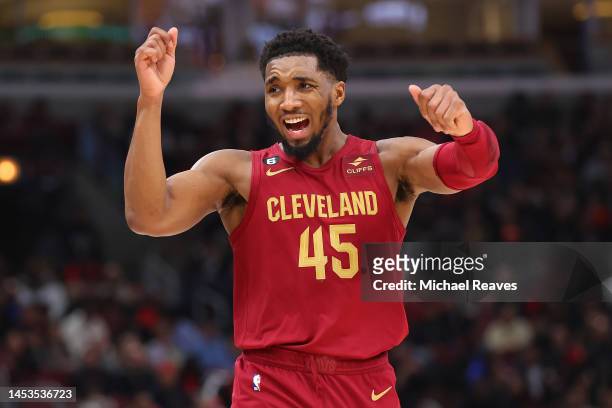Donovan Mitchell of the Cleveland Cavaliers celebrates a basket against the Chicago Bulls during the second half at United Center on December 31,...