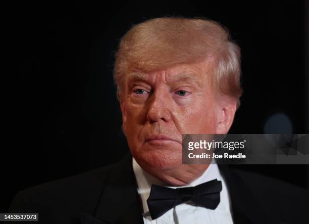 Former U.S. President Donald Trump arrives for a New Years event at his Mar-a-Lago home on December 31, 2022 in Palm Beach, Florida. Trump continues...