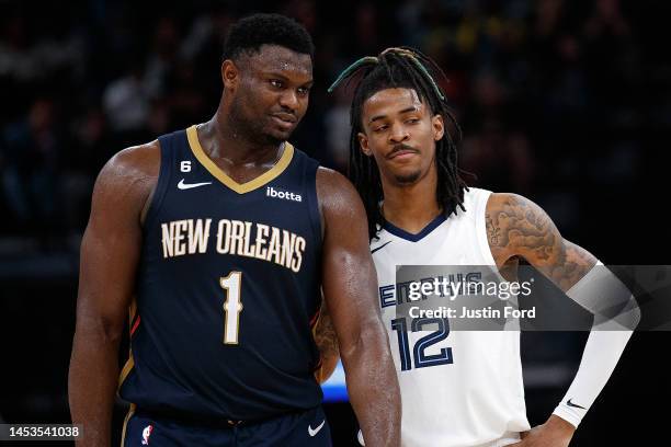 Zion Williamson of the New Orleans Pelicans and Ja Morant of the Memphis Grizzlies during the second half at FedExForum on December 31, 2022 in...