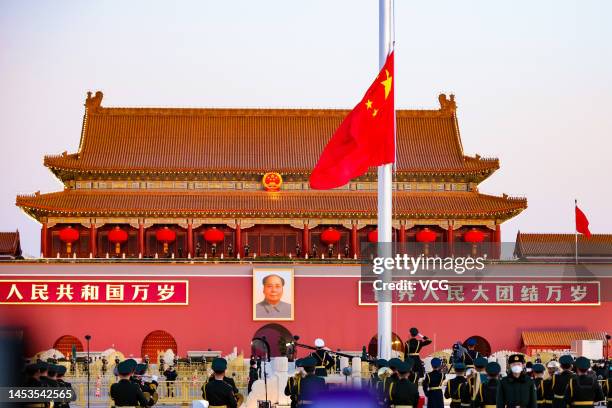 The Guard of Honor of the Chinese People's Liberation Army performs a flag-raising ceremony at the Tian'anmen Square to celebrate New Year's Day on...