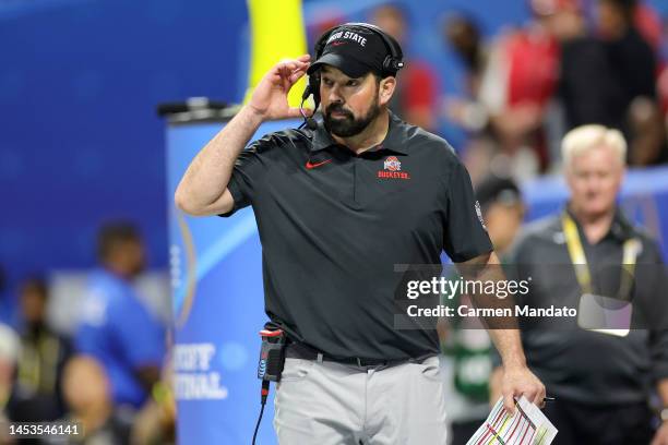 Head coach Ryan Day of the Ohio State Buckeyes is seen during the third quarter against the Georgia Bulldogs in the Chick-fil-A Peach Bowl at...