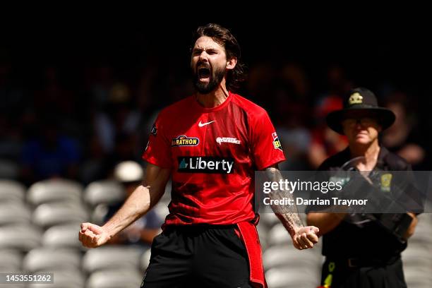 Kane Richardson of the Renegades celebrates the wicket of Faf Du Plesssis of the Scorchers during the Men's Big Bash League match between the...