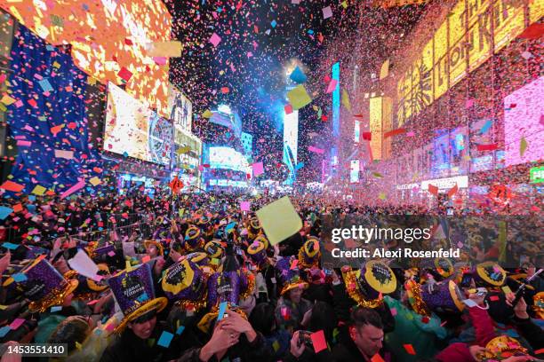 Revelers celebrate New Year’s Eve in Times Square as confetti falls on January 01, 2023 in New York City. This year's New Year's Eve returned to...