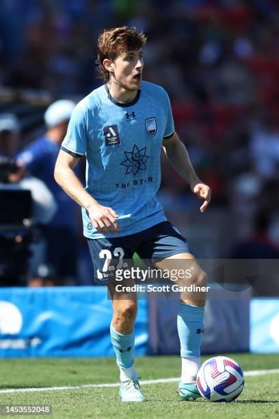 Max Burgess of Sydney FC with the ball during the round 10 A-League Men's match between Newcastle Jets and Sydney FC at McDonald Jones Stadium, on...