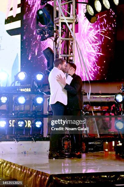 Jaymes Vaughan and Jonathan Bennett embrace after the ball drop during Dick Clark's New Year's Rockin' Eve With Ryan Seacrest 2023 on January 1, 2023...