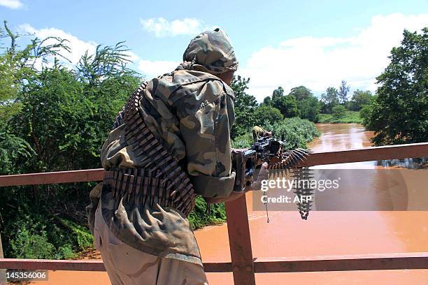 Transitional Federal Government soldiers patrol in Afgoye, north of Mogadishu on May 27, 2012 after they ousted Al Shebab fighters .Al-Qaeda-linked...