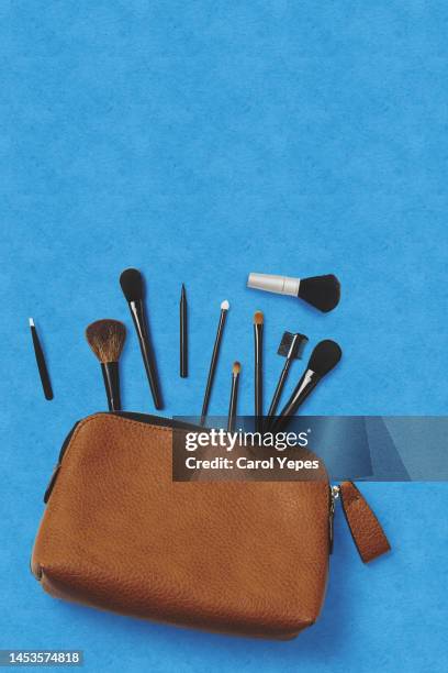 makeup bag with brushes and eyeshadows - cosmetics bag stock pictures, royalty-free photos & images