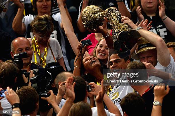 Daniel Narcisse of Kiel celebrates with fans after the EHF Final Four final match between THW Kiel and BM Atletico Madrid at Lanxess Arena on May 27,...