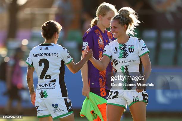Stacey Papadopoulos of Western United and Alana Cerne of Western United celebrate the win during the round eight A-League Women's match between Perth...