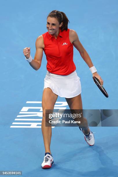 Petra Martic of Croatia celebrates winning a game in the third set of the Women's singles match against Nadia Podoroska of Argentina during day four...