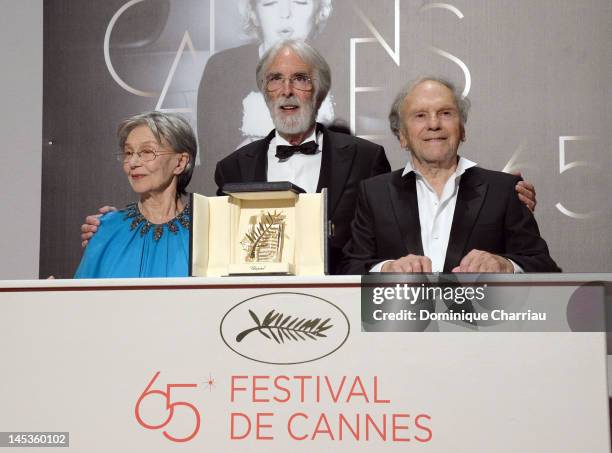 Actors Emmanuelle Riva, Jean-Louis Trintignant and director Michael Haneke pose with the Palme D?Or for 'Amour' at the Winners Photocall during the...