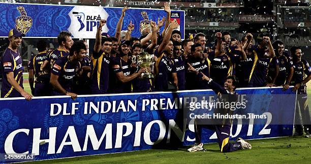 Kolkata Knight Riders pose with the Indian Premier League season 5 trophy at MA Chidambaram stadium on Sunday, May 27, 2012 in Chennai, India. In an...