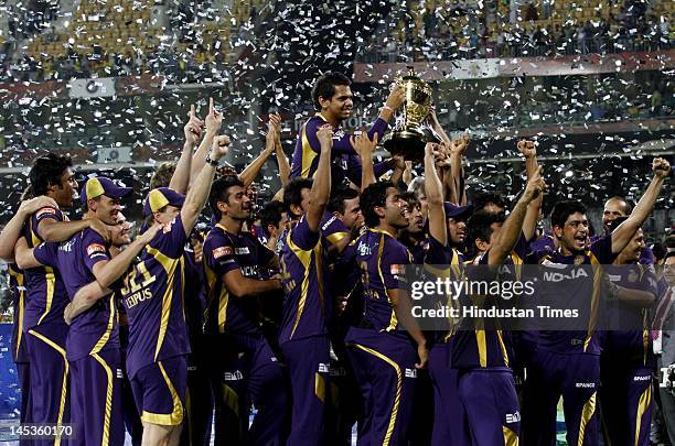 Kolkata Knight Riders pose with the Indian Premier League season 5 trophy at MA Chidambaram stadium on Sunday, May 27, 2012 in Chennai, India. In an...