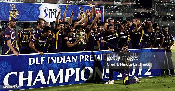 Kolkata Knight Riders pose with the Indian Premier League season 5 trophy at MA Chidambaram stadium on Sunday, May 27, 2012 in Chennai, India. In an...