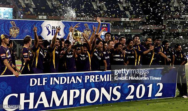 Kolkata Knight Riders pose with the Indian Premier League season 5 trophy at MA Chidambaram stadium on Sunday, May 27, 2012 in Chennai, India. In an...