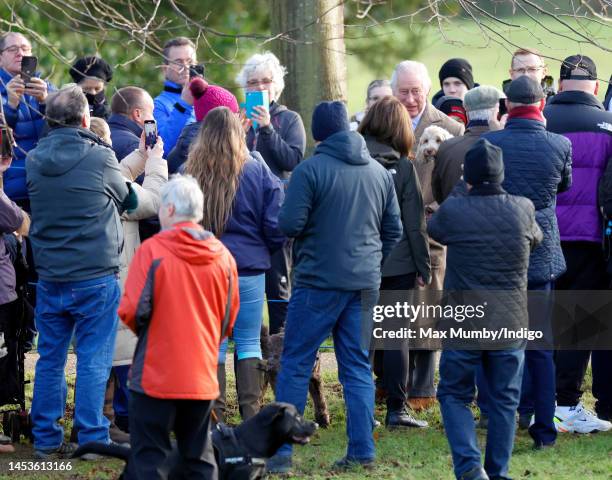 King Charles III meets members of the public after attending the New Year's Day service at the Church of St Mary Magdalene on the Sandringham estate...