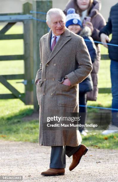 King Charles III departs after attending the New Year's Day service at the Church of St Mary Magdalene on the Sandringham estate on January 1, 2023...