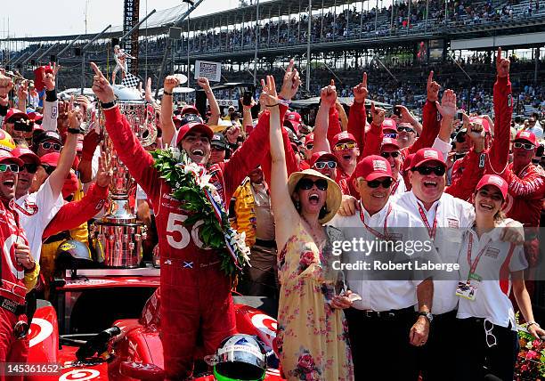 Dario Franchitti of Scotland, driver of the Target Chip Ganassi Racing Honda celebrates in victory lane with his wife actress Ashley Judd, team owner...