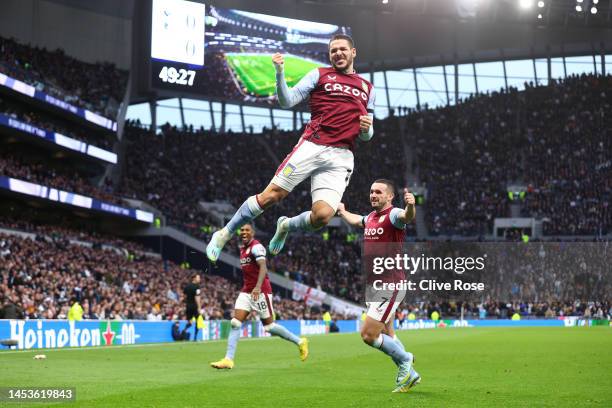 Emi Buendia of Aston Villa celebrates after scoring their side's first goal during the Premier League match between Tottenham Hotspur and Aston Villa...