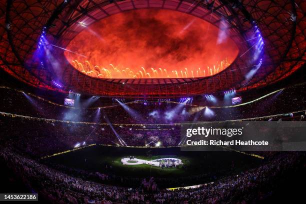 Fireworks go off as Lionel Messi of Argentina lifts the FIFA World Cup Trophy after the team's victory during the FIFA World Cup Qatar 2022 Final...