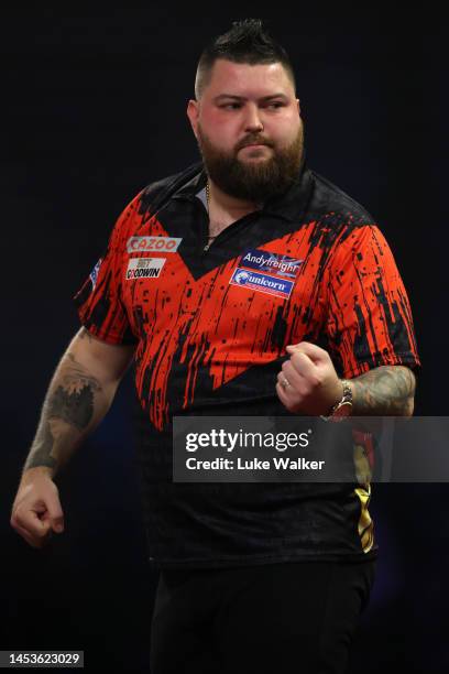 Michael Smith of England reacts during his Quarter-Final match against Stephen Bunting of England during Day Fourteen of the Cazoo World Darts...