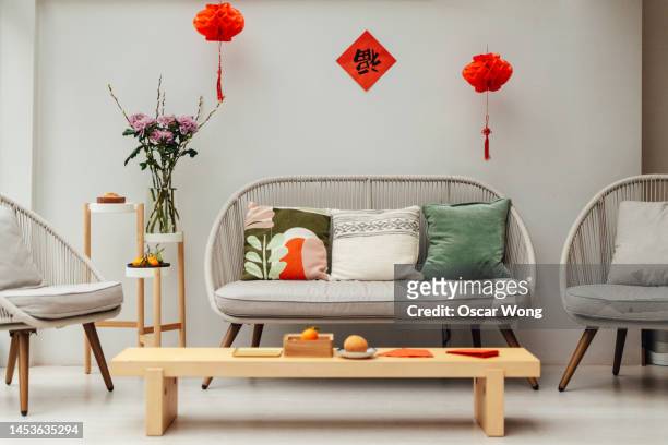 modern home interior with chinese new year decorations - feng shui house stock pictures, royalty-free photos & images