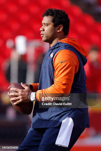Russell Wilson of the Denver Broncos warms up prior to the game prior to the game against the Kansas City Chiefs at Arrowhead Stadium on January 01,...