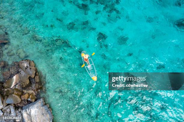 woman  kayaking - us virgin islands stock pictures, royalty-free photos & images