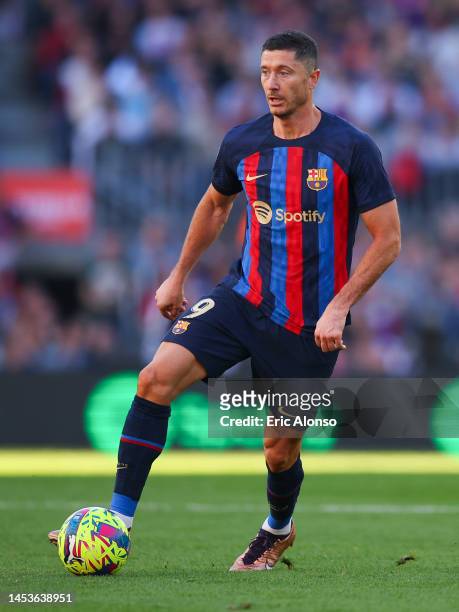 Robert Lewandowski FC Barcelona runs with the ball during the LaLiga Santander match between FC Barcelona and RCD Espanyol at Spotify Camp Nou on...