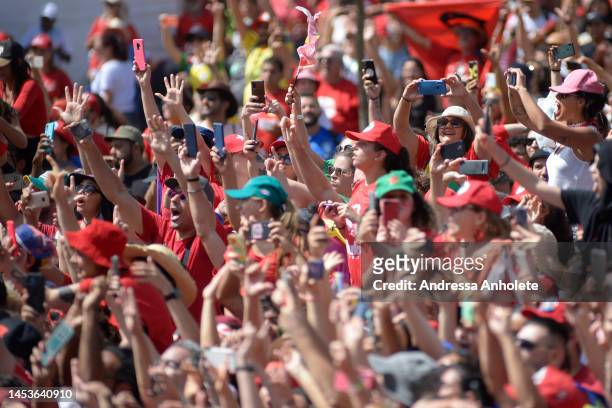 Supporters greet Luiz Inácio Lula Da Silva as he heads for the National Congress for the presidential inauguration ceremony on January 01, 2023 in...