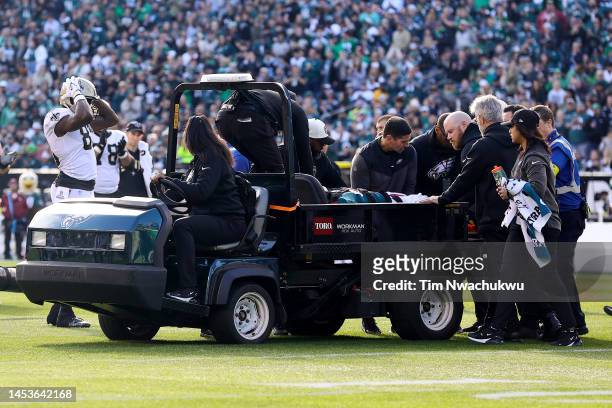 Josh Sweat of the Philadelphia Eagles is taken off the field after an injury against the New Orleans Saints during the first quarter at Lincoln...