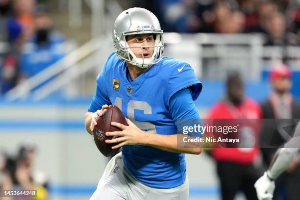 Jared Goff of the Detroit Lions looks to pass during the first quarter in the game against the Chicago Bears at Ford Field on January 01, 2023 in...