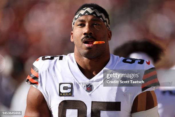 Myles Garrett of the Cleveland Browns looks on from the sidelines during the first quarter against the Washington Commanders at FedExField on January...