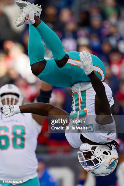 Tyreek Hill of the Miami Dolphins celebrates a touchdown against the New England Patriots during the second quarter at Gillette Stadium on January...