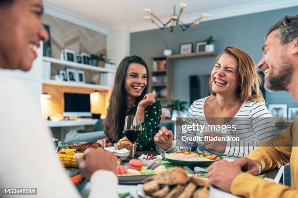 lunch with friends - family eating stock pictures, royalty-free photos & images