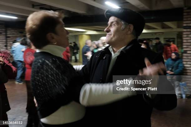 Elderly couples participate in an ongoing traditional dance gathering in an underground mall on January 01, 2023 in Kyiv, Ukraine. Kyiv, and much of...