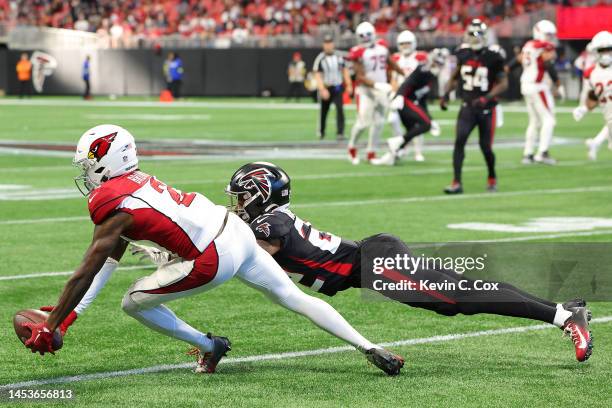 Marquise Brown of the Arizona Cardinals catches a pass while defended by Cornell Armstrong of the Atlanta Falcons during the third quarter at...