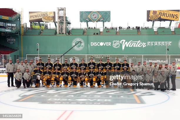 The Boston Bruins pose for a team photo prior to practice for the 2023 Winter Classic at Fenway Park on January 01, 2023 in Boston, Massachusetts.