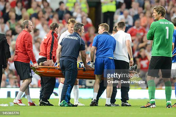 Teddy Sheringham injures Gordon Ramsay at Soccer Aid 2012 in aid of Unicef at Old Trafford on May 27, 2012 in Manchester, England.